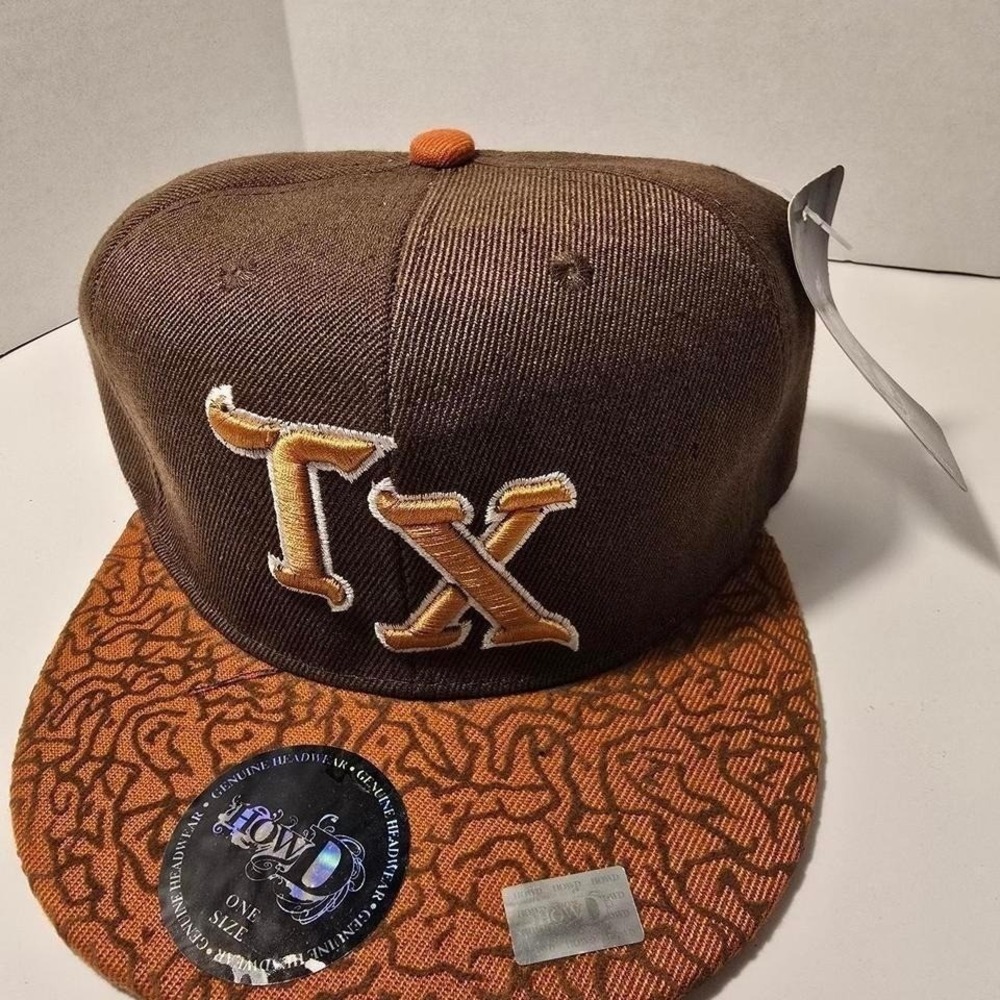 0052NWT HowD TX ball cap brown orange Texas squiggly adjustable.